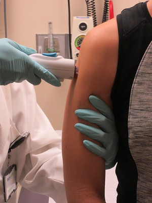 patient receiving treatment in their arm