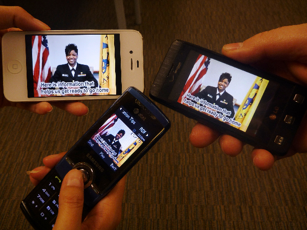 three cellphones with the same speaker on the screen