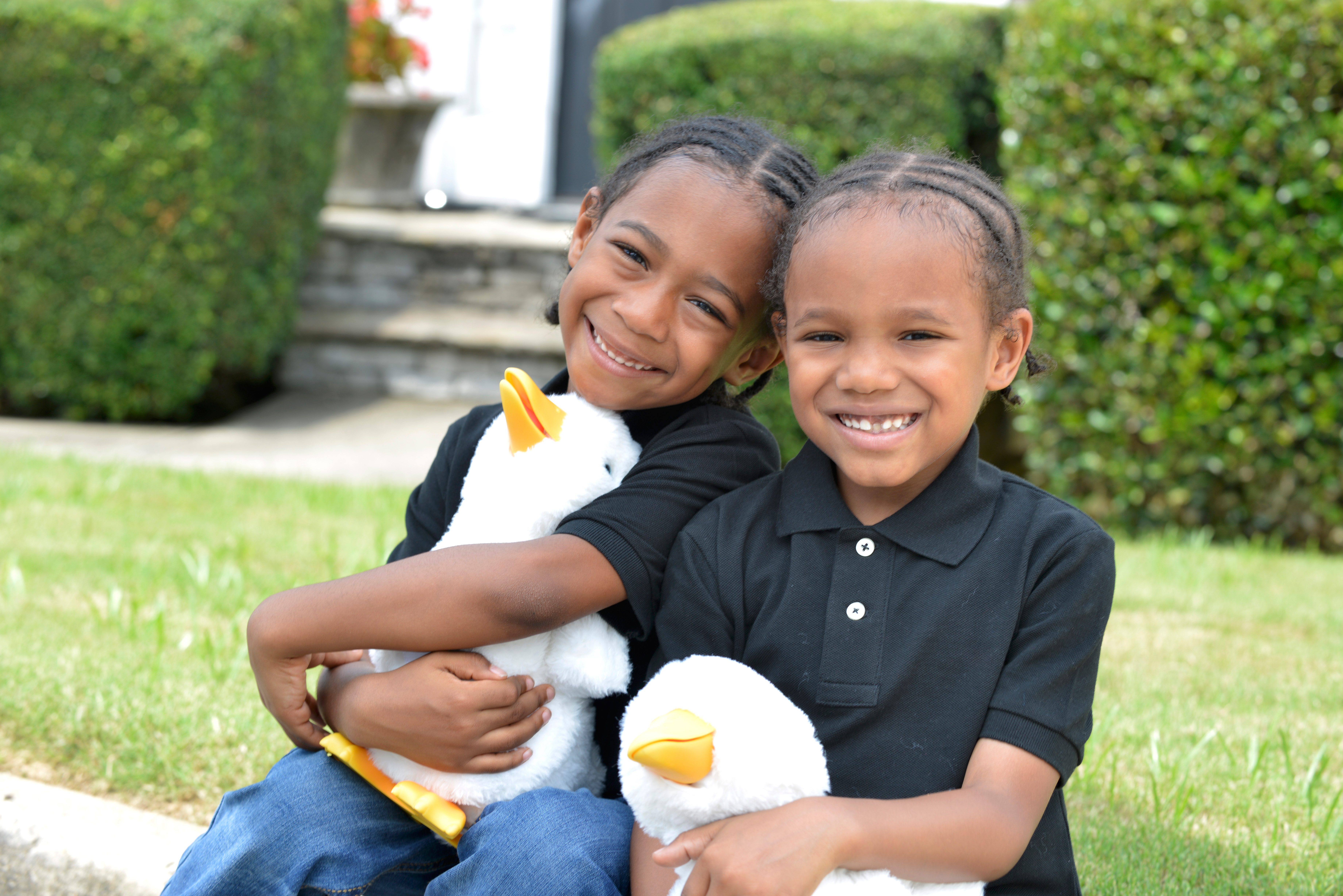 Children holding Sproutel’s My Special Aflac Duck®